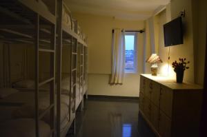 TV a/nebo společenská místnost v ubytování iDorm B&B - idorm Mỹ