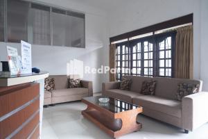 Posezení v ubytování Homestay C9 Exclusive Kaliurang Yogyakarta Mitra RedDoorz