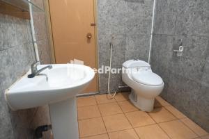 Koupelna v ubytování Homestay C9 Exclusive Kaliurang Yogyakarta Mitra RedDoorz