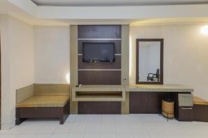 Kuchyň nebo kuchyňský kout v ubytování Urbanview Hotel Taman Suci Denpasar Bali