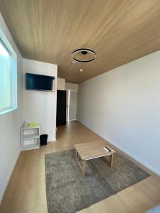 TV a/nebo společenská místnost v ubytování Guest House DARUMA