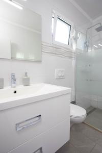 Koupelna v ubytování Apartments Edi - ZF Hvar