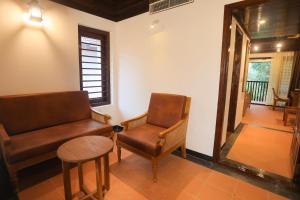 Posezení v ubytování Heaven Inn Munnar