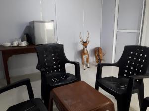 A seating area at Triple Tree Cottage