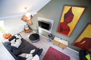 an overhead view of a living room with a couch at BIG MAMA free parking in Colmar