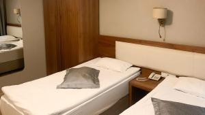 A bed or beds in a room at Reikartz 2017