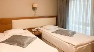 A bed or beds in a room at Reikartz 2017
