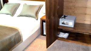 A bed or beds in a room at Reikartz 2017