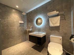 Koupelna v ubytování GD Hotel