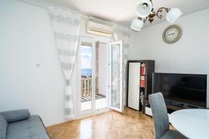 TV a/nebo společenská místnost v ubytování Apartment Debos