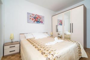 Postel nebo postele na pokoji v ubytování Apartment Debos