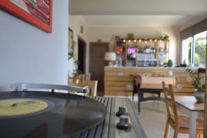 a living room with a table and a dining room at Good Morning Etna in Bronte