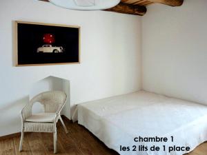 Posteľ alebo postele v izbe v ubytovaní Maison de charme en campagne à Arlempdes avec jardin