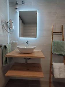 a bathroom with a sink and a mirror at Benal Beach 229 in Benalmádena