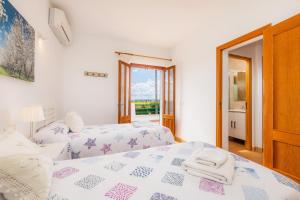 Postel nebo postele na pokoji v ubytování Finca Goet