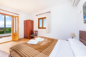 Postel nebo postele na pokoji v ubytování Finca Goet
