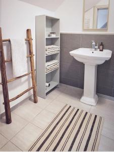 Kúpeľňa v ubytovaní FORMA Apartament Supraśl