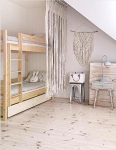 Posteľ alebo postele v izbe v ubytovaní FORMA Apartament Supraśl