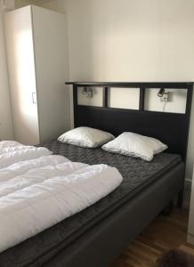 מיטה או מיטות בחדר ב-Björnrike Vemdalen. Mitt i backen