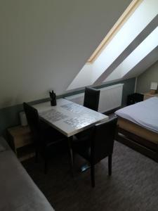 A bed or beds in a room at APARTMÁNY PIETRO