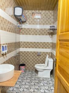 Koupelna v ubytování Homestay Cối Xay Gió Hà Giang + 20 fotografií