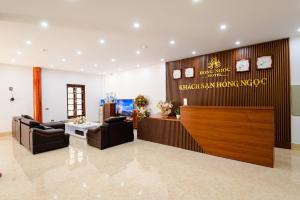 a lobby of a hotel with couches and a reception desk at Hồng Ngọc Hotel in Lạng Sơn