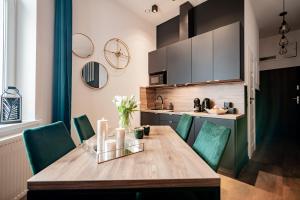 Kuchnia lub aneks kuchenny w obiekcie Ottimo Apartamenty Jagiellońska