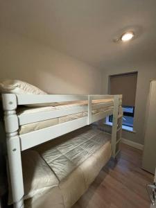 a white bunk bed in a room at Apartment , Centre Carrick-On-Shannon in Carrick on Shannon