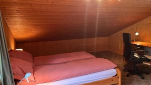 Postel nebo postele na pokoji v ubytování Chalet ALPEN LOTUS
