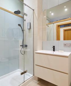 a bathroom with a sink and a shower at Eder 2 by FeelFree Rentals in San Sebastián