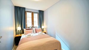 Ένα ή περισσότερα κρεβάτια σε δωμάτιο στο Apartamenty EverySky - Nad Łomnicą 14A-B +40 φωτογραφίες