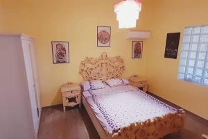 A bed or beds in a room at Amethyst