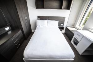 Ένα ή περισσότερα κρεβάτια σε δωμάτιο στο University of Bath Summer Accommodation