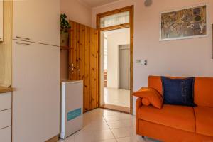 A kitchen or kitchenette at Lido degli Estensi Terrace Apartment