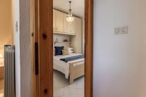 A bed or beds in a room at Lido degli Estensi Terrace Apartment