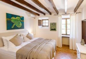 Posteľ alebo postele v izbe v ubytovaní Finca Can Coll Boutique Country House - Adults Only