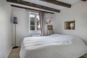 Posteľ alebo postele v izbe v ubytovaní Superbe maison pour 10 personnes à Sarzeau