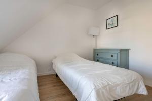 Posteľ alebo postele v izbe v ubytovaní Superbe maison pour 10 personnes à Sarzeau