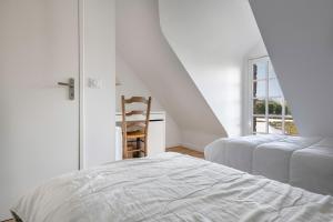 Posteľ alebo postele v izbe v ubytovaní Superbe maison pour 10 personnes à Sarzeau