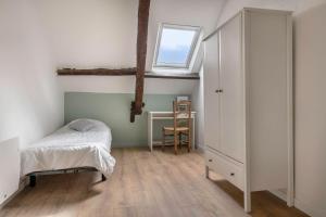 Posteľ alebo postele v izbe v ubytovaní Superbe maison pour 10 personnes à Sarzeau