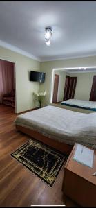 Krevet ili kreveti u jedinici u okviru objekta Tiraspol Apartament