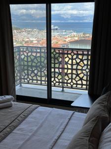 Postel nebo postele na pokoji v ubytování Nova Butik Hotel Çeşme