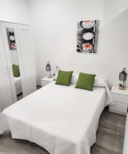 Cama o camas de una habitación en Green Apartamentos Cartagena