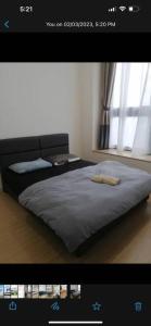 A bed or beds in a room at Sunway Grid by One Team