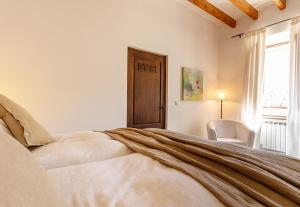 Posteľ alebo postele v izbe v ubytovaní Finca Can Coll Boutique Country House - Adults Only
