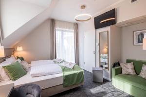 Postel nebo postele na pokoji v ubytování Villa Bérc