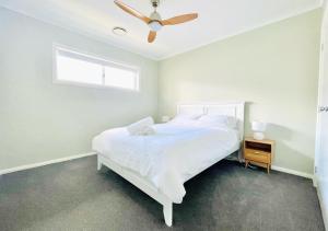 Llit o llits en una habitació de Coolalta Cottage - Hunter Valley