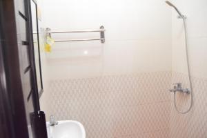 Koupelna v ubytování Roemah Canting Homestay