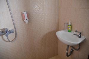 Koupelna v ubytování Roemah Canting Homestay