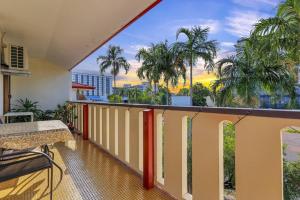 a balcony with a view of a city at Joyful Esplanade City Stay in Darwin